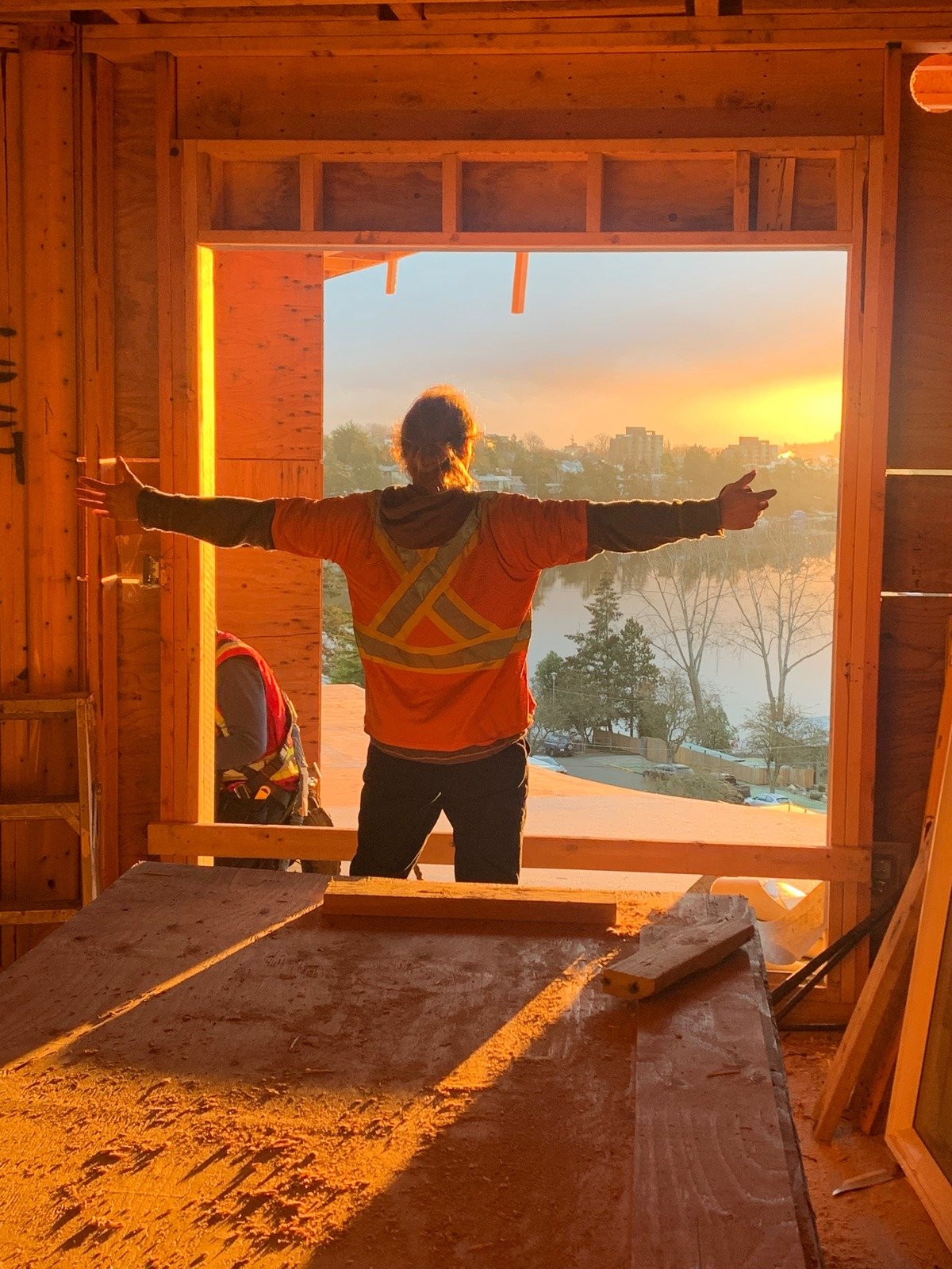 Carpenter at work during golden hour on a Victoria renovation